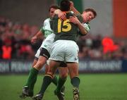 19 November 2000; Thinus Delport of South Africa is tackled by Brian O'Driscoll of Ireland during the International Rugby Friendly match between Ireland and South Africa at Lansdowne Road in Dublin. Photo by Ray Lohan/Sportsfile