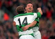 19 November 2000; Denis Hickie, 14, celebrates with Ireland team-mate Rob Henderson after scoring a try during the International Rugby Friendly match between Ireland and South Africa at Lansdowne Road in Dublin. Photo by Aoife Rice/Sportsfile