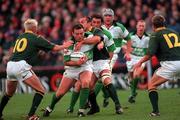 19 November 2000; Rob Henderson of Ireland is tackled by Corne Krige and and Percy Montgomery of South Africa during the International Rugby Friendly match between Ireland and South Africa at Lansdowne Road in Dublin. Photo by Matt Browne/Sportsfile