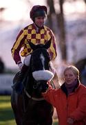 14 January 2001; Jockey Conor O'Dwyer on Ross Moff, after winning The Fitzpatrick Hotel Group Novice Steeplechase at Leopardstown Racecourse in Dublin. Photo by Brendan Moran/Sportsfile