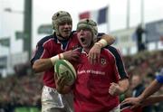 20 January 2001; Anthony Foley, Munster, is congratulated by team-mate Alan Quinlan after scoring his sides first try  against Castres. Munster v Castres, Heineken European Cup, Musgrave Park, Cork. Rugby. Picture credit; Brendan Moran/SPORTSFILE *EDI*