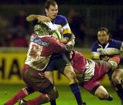 20 January 2001; Girvan Dempsey of Leinster is tackled by Serge Betsen, left, and Denis Avril of Biarritz during the Heineken Cup Pool 1 Round 6 match between Biarritz and Leinster at Park de Sport Aguilera in Biarritz, France. Photo by Matt Browne/Sportsfile
