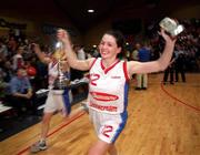 30 January 2000; Wildcats captain Christine Kelly celebrates with the cup during the Senior Women's Sprite Cup Final match between Avonmore Wildcats and Meteors at the National Basketball Arena in Tallaght, Dublin. Photo by Brendan Moran/Sportsfile