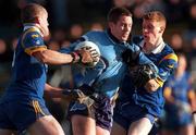 21 January 2001; Kenneth Darcy of Dublin holds off the challange from Gary Doran, left, and Thomas Burke of  Wicklow during the O'Byrne Cup Quarter-Final match between Wicklow and Dublin at the County Grounds in Aughrim, Wicklow. Photo by David Maher/Sportsfile