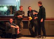 23 January 2001; Cork footballers, from left, Philip Clifford, Anthony Lynch, Kevin O'Dwyer and Nicholas Murphy, await the departure of their flight to Saudi Arabia, via London, for the Eircell Allstars football game which takes place in Dubai on Friday next. Photo by Brendan Moran/Sportsfile