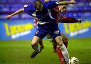 23 January 2001; Richie Baker of Shelbourne in action against Sean Hargan of Derry City during the Eircom League Premier Division match between Shelbourne and Derry City at Tolka Park in Dublin. Photo by David Maher/Sportsfile