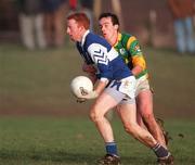 21 January 2001; Michael Lawlor of Laois in action against Anthony Moyles of Meath during the O'Byrne Cup Quarter-Final match between Laois and Meath at Stradbally in Laois. Photo by Damien Eagers/Sportsfile