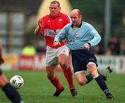 21 January 2001; Paul Doolin of Shelbourne in action against Steve Gaughan of Cork City during the Eircom League Premier Division match between Cork City and Shelbourne at Turners Cross in Cork. Photo by Brendan Moran/Sportsfile