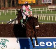 21 January 2001; Brown Buck, with Barry Cash up, jumps the fence first time round during The Bailey's Arkle Perpetual Challenge Cup Novice Steeplechase at Leopardstown Racecourse in Dublin. Photo by Ray McManus/Sportsfile