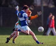 21 January 2001; Colm Parkinson of Laois in action against Enda McManus of Meath during the O'Byrne Cup Quarter-Final match between Laois and Meath at Stradbally in Laois. Photo by Damien Eagers/Sportsfile