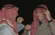 25 January 2001; Armagh players Kieran McGeeney and Diarmaid Marsden pictured during a traditional Bedouin evening during the Eircell GAA All-Star Tour to Dubai, United Arab Emirates. Photo by Ray McManus/Sportsfile