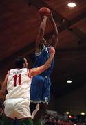 26 January 2001; Lester Hunt of Waterford Crystal goes up for a basket despite the challenge of Liam McHale of Longnecks Ballina during the ESB Men's Cup Semi-Final match between Waterford Crystal and Longnecks Ballina at the National Basketball Arena in Tallaght, Dublin. Photo by Brendan Moran/Sportsfile