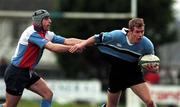 27 January 2001; Eric Elwood of Galwegians is tackled by Niall Malone of Belfast Harlequins during the AIB All-Ireland League Division 1 match between Galwegians and Belfast Harlequins at Crowley Park in Galway. Photo by Ray Lohan/Sportsfile