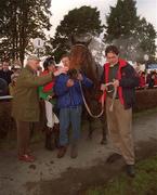 27 January 2001; Limestone Lad with winning connections, from left, trainer James Bowe, jockey Shane McGovern, and Michael Bowe, son of James Bowe at Fairyhouse Racecourse in Ratoath, Meath. Photo by Damien Eagers/Sportsfile