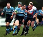 27 January 2001; Eric Elwood of Galwegians is tackled by Chris McCarey of Belfast Harlequins during the AIB All-Ireland League Division 1 match between Galwegians and Belfast Harlequins at Crowley Park in Galway. Photo by Ray Lohan/Sportsfile