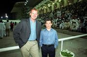 26 January 2001; Pictured at the races in Dubai are Kerry footballer and All-Star Liam Hassett with jockey Timmy Houlihan, from Kilorglin during an exhibition match on the Eircell GAA All-Star tour at the Dubai Rugby Ground in Dubai, United Arab Emirates. Photo by Ray McManus/Sportsfile
