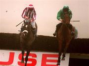 28 January 2001; Klairon Davis, left, with Conor O'Dwyer up, clears the last ahead of Papillon, with Ruby Walsh up, on their way to winning The Normans Grove Steeplechase at Fairyhouse Racecourse in Ratoath, Meath. Photo by Damien Eagers/Sportsfile