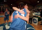 28 January 2001; Wildcats players Trish Nolan, left, and Olivia O'Reilly embrace after victory in the ESB Women's Cup Final match between Wildcats and Tolka Rovers at the National Basketball Arena in Tallaght, Dublin. Photo by Brendan Moran/Sportsfile