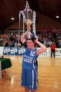 28 January 2001; Wildcats captain Christine Kiely, lifts the cup after her teams victory in the ESB Women's Cup Final match between Wildcats and Tolka Rovers at the National Basketball Arena in Tallaght, Dublin. Photo by Brendan Moran/Sportsfile
