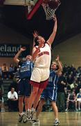 28 January 2001; Lorraine O'Brien of Tolka Rovers shoots for a basket despite the best efforts of Chrsitine Kiely of Wildcats during the ESB Women's Cup Final match between Wildcats and Tolka Rovers at the National Basketball Arena in Tallaght, Dublin. Photo by Brendan Moran/Sportsfile