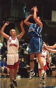 28 January 2001; Jillian Hayes of Wildcats shoots for a basket despite the best efforts of Sharyn Kelly of Tolka Rovers during the ESB Women's Cup Final match between Wildcats and Tolka Rovers at the National Basketball Arena in Tallaght, Dublin. Photo by Brendan Moran/Sportsfile