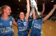 28 January 2001; Wildcats' team captain Christine Kiely, centre, leads the celebrations with team-mates Christine Kiely, left,, who was voted MVP, and Olivia O'Reilly following the ESB Women's Cup Final match between Wildcats and Tolka Rovers at the National Basketball Arena in Tallaght, Dublin. Photo by Brendan Moran/Sportsfile