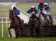 28 January 2001; Johnny Ringo, left, with Jason Titley up, races clear of with Caol Na Sprida, Ross Geraghty up, to go on and win The Kehoe Partitions & Ceilings Maiden Hurdle Fairyhouse, Co. Meath. horse racing. Picture credit; Damien Eagers/SPORTSFILE