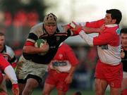 28 January 2001; Anthony Foley of Munster in action against Marc Lievremont of Biarritz during the Heineken Cup Quarter-Final match between Munster and Biarritz at Thomond Park in Limerick. Photo by Ray Lohan/Sportsfile