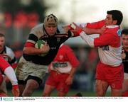 28 January 2001; Anthony Foley, Munster, in action against Marc Lievremont, Biarritz. Munster v Biarritz, Heineken European Cup, Thomond Park, Limerick. Rugby. Picture credit; Ray Lohan/SPORTSFILE
