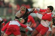 28 January 2001; Anthony Foley of Munster in action against Bernard Daguerre, left, and Marc Lievremont of Biarritz during the Heineken Cup Quarter-Final match between Munster and Biarritz at Thomond Park in Limerick. Photo by Ray Lohan/Sportsfile
