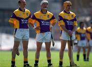 18 June 2000; Wexford hurlers, from left, Larry Murphy, Tom Dempsey and Chris McGrath stand for the National Anthem ahead of the Guinness Leinster Senior Hurling Championship semi-final match between Offaly and Wexford at Croke Park in Dublin. Photo by Ray McManus/Sportsfile