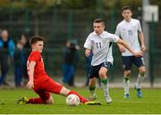26 November 2015; Adam O'Reilly, Republic of Ireland, in action against Maciej Rosolek, Poland. U15 Friendly International, Republic of Ireland v Poland, Rock Park Celtic FC, Dundalk, Co. Louth. Picture credit: Oliver McVeigh / SPORTSFILE