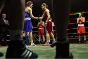 27 November 2015; Katie Taylor, right, Bray Boxing Club,  shakes hands with Shauna O'Keefe, Clonmel Boxing Club, before their 60kg bout. IABA National Elite Female Championship Finals. National Stadium, Dublin. Picture credit: David Maher / SPORTSFILE