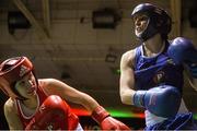 27 November 2015; Lauren Hogan, left, St.Brigids Boxing Club, trades punches with Donna Barr, Twin Towns Boxing Club, during their 48kg bout. IABA National Elite Female Championship Finals. National Stadium, Dublin. Picture credit: David Maher / SPORTSFILE