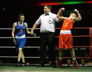 27 November 2015; Lauren Hogan, St.Brigids Boxing Club, is declared the winner over Donna Barr, Twin Towns Boxing Club, at the end of their 48kg bout. IABA National Elite Female Championship Finals. National Stadium, Dublin. Picture credit: David Maher / SPORTSFILE