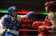 27 November 2015; Michaela Walsh, right, Holy Family GG Boxing Club, trades punches with Ceire Smith, Cavan Boxing Club, during their 51kg bout. IABA National Elite Female Championship Finals. National Stadium, Dublin. Picture credit: David Maher / SPORTSFILE