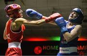 27 November 2015; Joanne Lambe, left, Carrickmacross Boxing Club, trades punches with Moira McElligott, St.Michael's Boxing Club, during their 57kg bout. IABA National Elite Female Championship Finals. National Stadium, Dublin. Picture credit: David Maher / SPORTSFILE