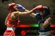 27 November 2015; Joanne Lambe, left, Carrickmacross Boxing Club,  trades punches with Moira McElligott, St.Michael's Boxing Club, during their 57kg bout. IABA National Elite Female Championship Finals. National Stadium, Dublin. Picture credit: David Maher / SPORTSFILE