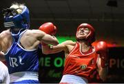 27 November 2015; Joanne Lambe, right, Carrickmacross Boxing Club,  trades punches with Moira McElligott, St.Michael's Boxing Club, during their 57kg bout. IABA National Elite Female Championship Finals. National Stadium, Dublin. Picture credit: David Maher / SPORTSFILE