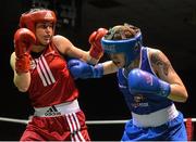 27 November 2015; Katie Taylor, left, Bray Boxing Club, trades punches with Shauna O'Keefe, Clonmel Boxing Club, during their 60kg bout. IABA National Elite Female Championship Finals. National Stadium, Dublin. Picture credit: David Maher / SPORTSFILE