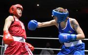27 November 2015; Shauna O'Keefe, right, Clonmel Boxing Club, trades punches with Katie Taylor, Bray Boxing Club, during their 60kg bout. IABA National Elite Female Championship Finals. National Stadium, Dublin. Picture credit: David Maher / SPORTSFILE