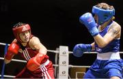 27 November 2015; Katie Taylor, left, Bray Boxing Club,  trades punches with Shauna O'Keefe, Clonmel Boxing Club, during their 60kg bout. IABA National Elite Female Championship Finals. National Stadium, Dublin. Picture credit: David Maher / SPORTSFILE