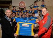 28 November 2015; Pictured is Kieran Carolan, right, from Carroll’s Cuisine, presenting Castleknock GAA Chairman Charles Spillane and the Castleknock GAA Minor Football Team with a brand new set of jerseys. The team are among the 25 winners of Carroll’s jersey competition, which attracted hundreds of entries from across the country. The competition, which was created to celebrate 25 years of Carroll’s supporting Offaly GAA asked clubs/schools to simply describe why they deserve to win a set of jerseys. Dave O’Brien from Castleknock entered a fantastic witty poem into the competition which got the attention of the judges and resulted in the team being awarded a free set of jerseys from Carroll’s. Castleknock Hotel, Dublin 15. Picture credit: Cody Glenn / SPORTSFILE