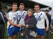 28 November 2015; Mary Daly celebrates St Mary's victory with her grandsons, from left, Paul O'Donogue, Denis and Daniel Daly. AIB Munster GAA Football Intermediate Club Championship Final, St Mary's, Kerry, v Carrigaline, Cork. Fitzgerald Stadium, Killarney, Co. Kerry. Picture credit: Stephen McCarthy / SPORTSFILE