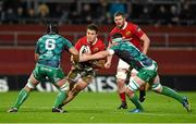 28 November 2015; Gerhard van den Heever, Munster, is tackled by John Muldoon, left, and James Connolly, Connacht. Guinness PRO12, Round 8, Munster v Connacht. Thomond Park, Limerick. Picture credit: Diarmuid Greene / SPORTSFILE
