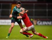 28 November 2015; Tiernan O'Halloran, Connacht, is tackled by Jack O'Donoghue, Munster. Guinness PRO12, Round 8, Munster v Connacht. Thomond Park, Limerick. Picture credit: Seb Daly / SPORTSFILE