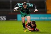 28 November 2015; Robbie Henshaw, Connacht, is tackled by Ian Keatley, Munster. Guinness PRO12, Round 8, Munster v Connacht. Thomond Park, Limerick. Picture credit: Seb Daly / SPORTSFILE