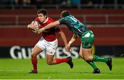 28 November 2015; Lucas Gonzalez Amorosino, Munster, is tackled by AJ MacGinty, Connacht. Guinness PRO12, Round 8, Munster v Connacht. Thomond Park, Limerick. Picture credit: Diarmuid Greene / SPORTSFILE