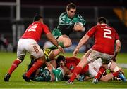28 November 2015; Craig Ronaldson, Connacht, jumps over teammate Bundee Aki, and Munster's James Cronin, before being tackled by Francis Saili and Niall Scannell. Guinness PRO12, Round 8, Munster v Connacht. Thomond Park, Limerick. Picture credit: Seb Daly / SPORTSFILE