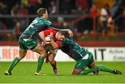 28 November 2015; Ian Keatley, Munster, is tackled by Craig Ronaldson, left, and Nathan White, Connacht. Guinness PRO12, Round 8, Munster v Connacht. Thomond Park, Limerick. Picture credit: Diarmuid Greene / SPORTSFILE